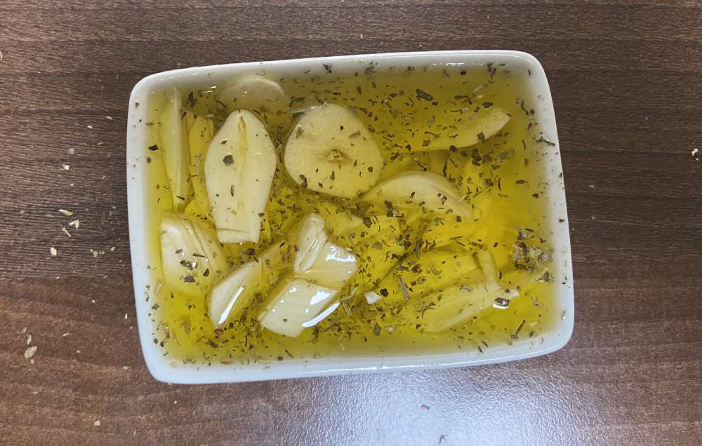 Garlic with herbs in olive oil