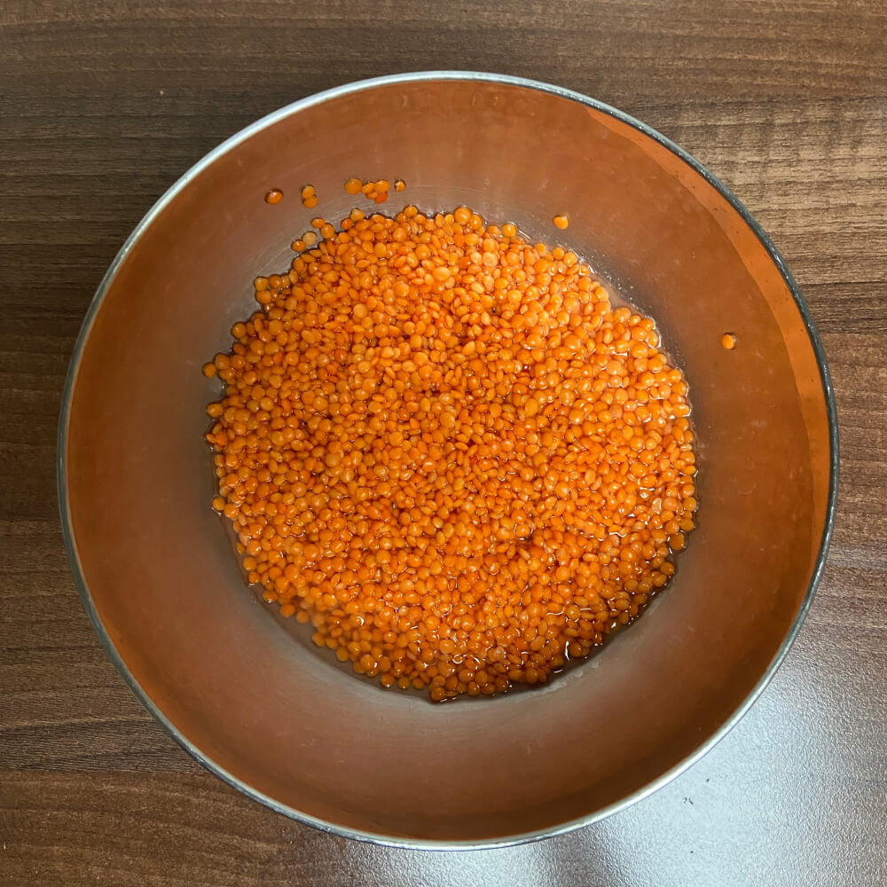 Washed and drained lentils soaking