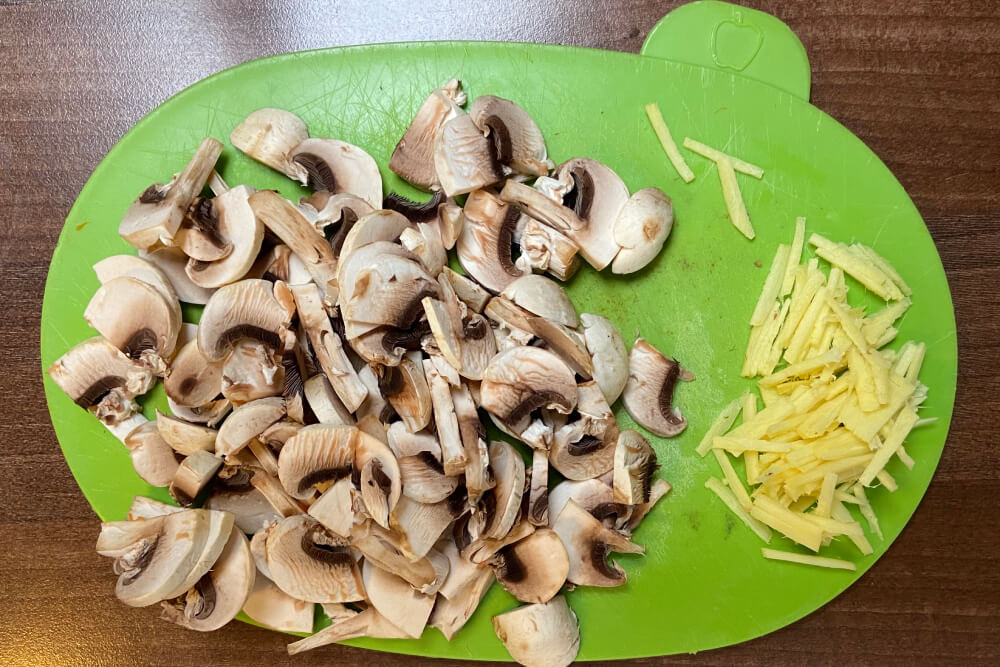 Chopped mushrooms and ginger matchsticks